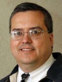 J. John Baer