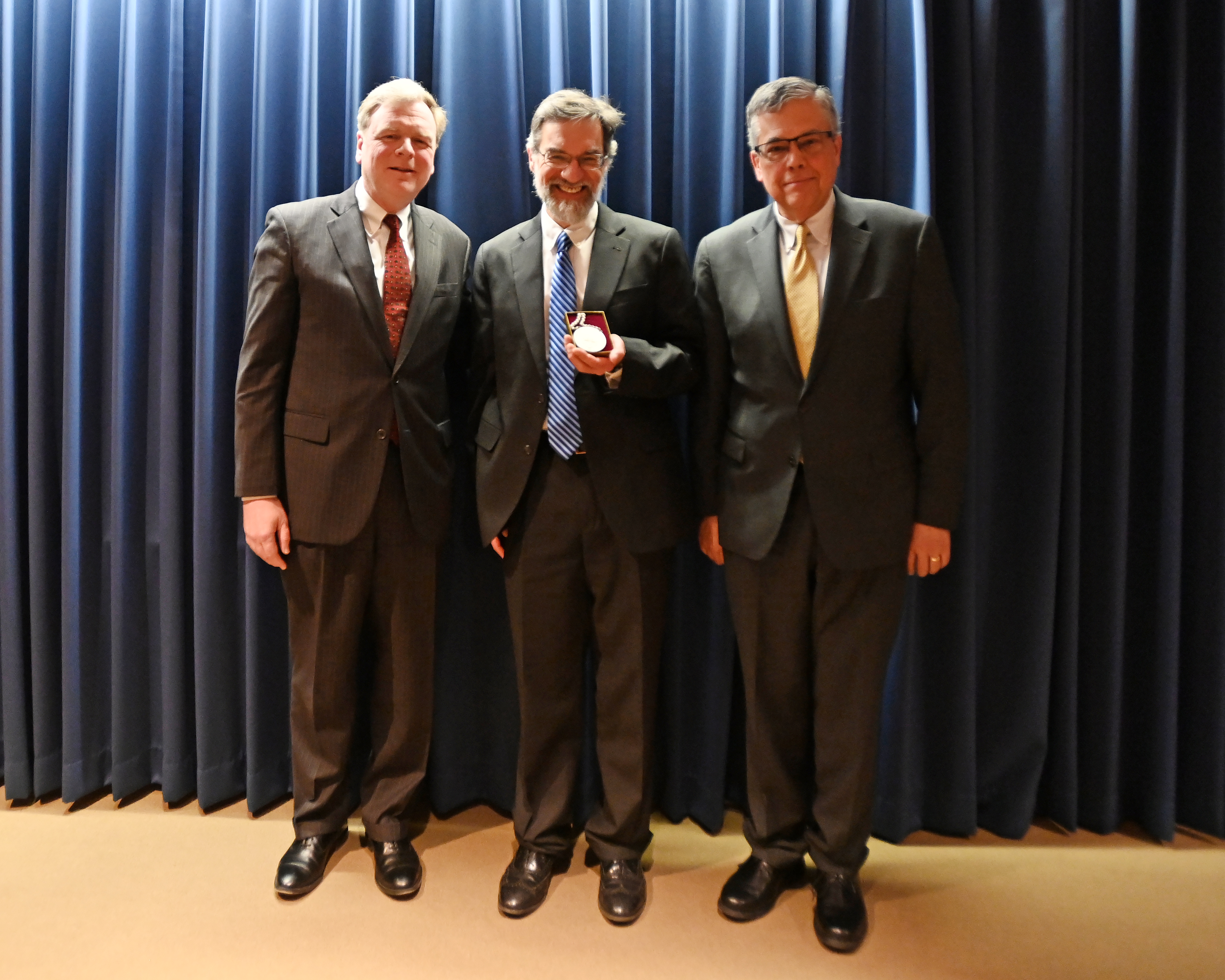 Dean Lewis, Dr. Gorman, and President Kilpatrick pose for a photo.