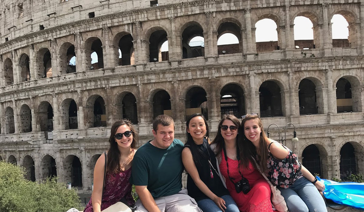 Students in front of the Colosseum in Rome